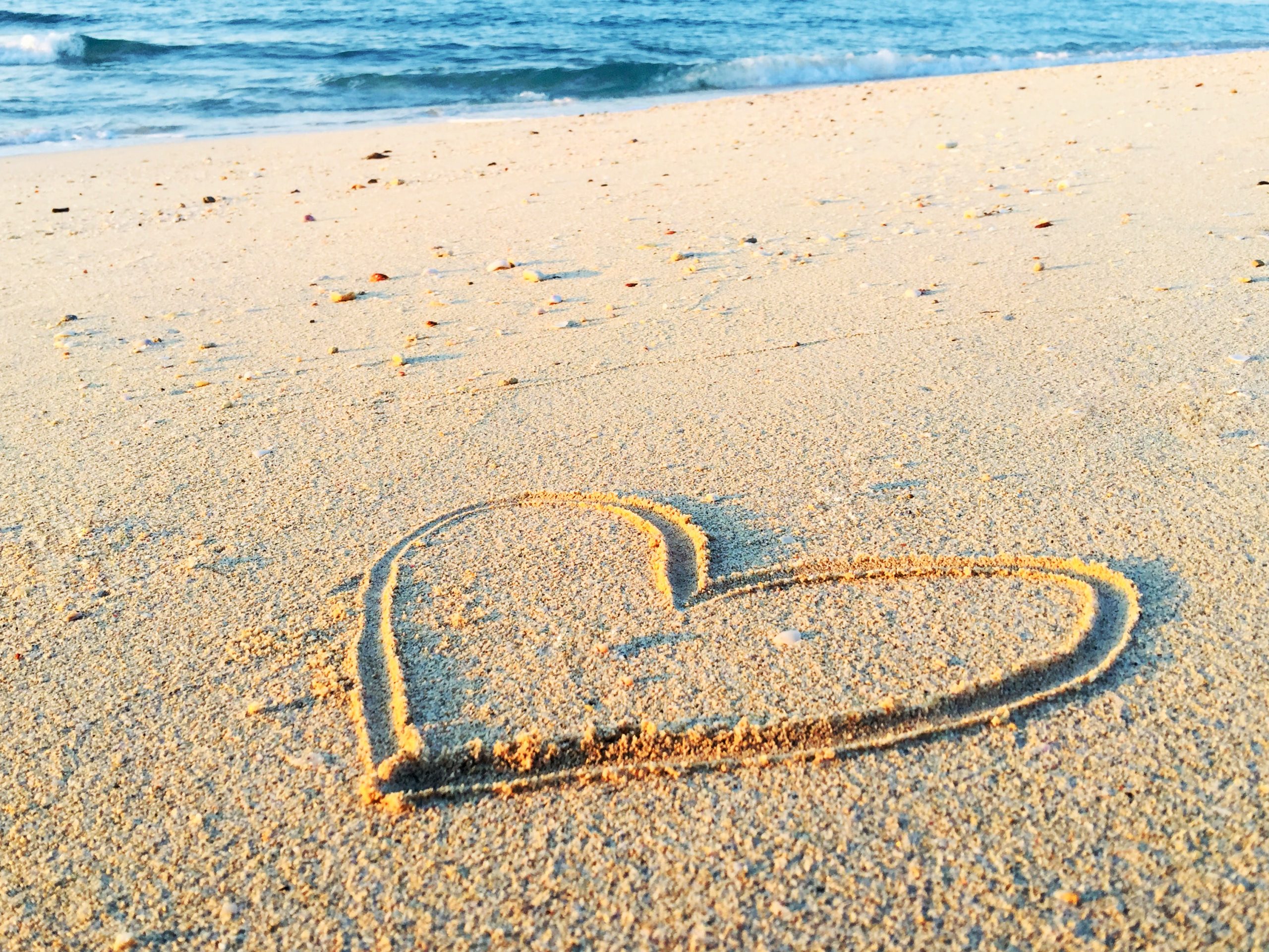 Parent Coaching - image of beach with heart